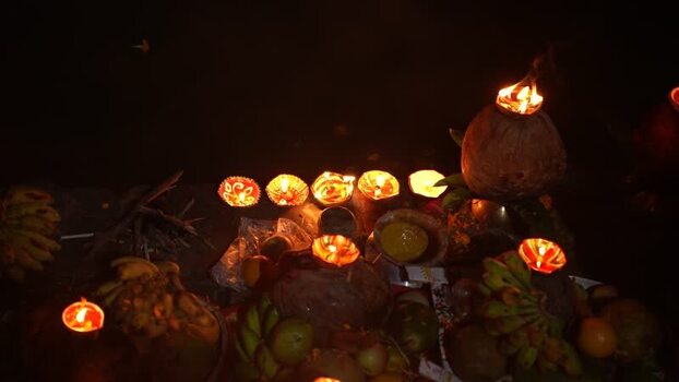 View of burning oil lamps and ritual offerings at night Bangladesh. View of burning oil lamps and ritual offerings at night Bangladesh.