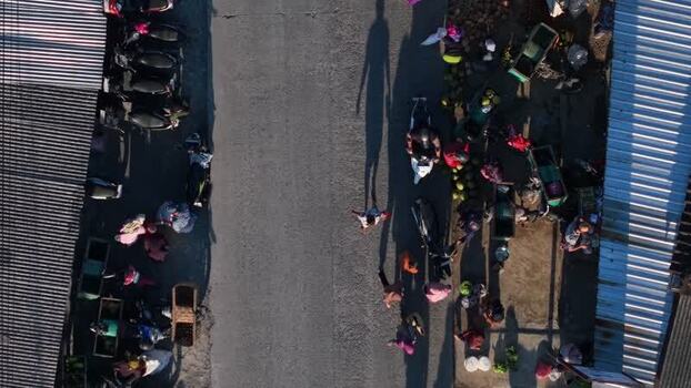 Aerial view of people at a street market in Kemalang Indonesia.