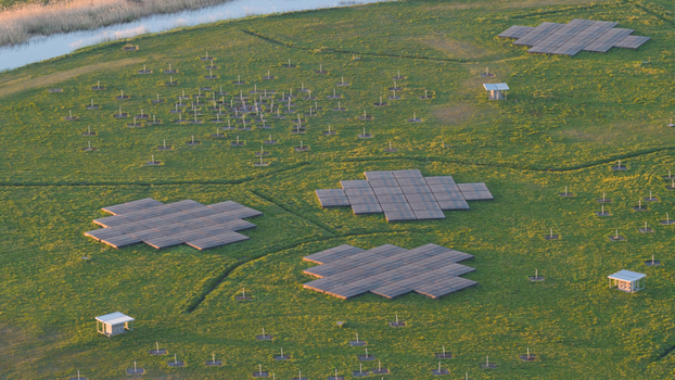 Aerial view of the LOFAR superterp radio telescope array with geometric antenna tiles on a green field at sunset in Buinen Drenthe Netherlands. Aerial view of the LOFAR superterp radio telescope array with geometric antenna tiles on a green field at sunset in Buinen Drenthe Netherlands.