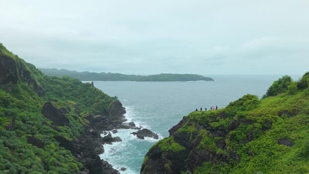 Aerial view of Bukit Pengilon cliffs and people Indonesia.