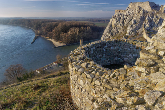 View of the historic stone ruins of Devin Castle overlooking the confluence of the Danube and Morava rivers under a clear sky in Bratislava IV Bratislava Region Slovakia. View of the historic stone ruins of Devin Castle overlooking the confluence of the Danube and Morava rivers under a clear sky in Bratislava IV Bratislava Region Slovakia.