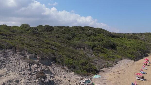 Aerial view of beach with red umbrellas in Northern Cyprus.