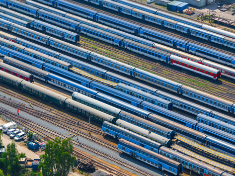 Aerial view of a busy train yard in Prague featuring numerous passenger trains parked on parallel railway tracks Prague Prague Czechia.