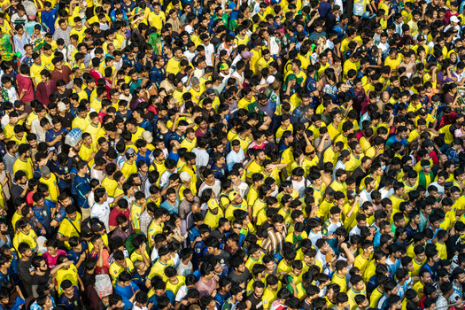 Dhaka Bangladesh 20 June 2026 Aerial view of a large crowd of football fans wearing yellow shirts gathered at Dhaka University Campus. Dhaka Bangladesh 20 June 2026 Aerial view of a large crowd of football fans wearing yellow shirts gathered at Dhaka University Campus.