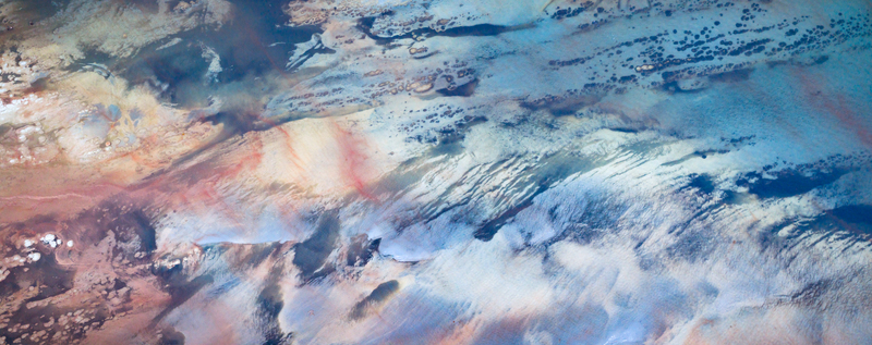 Aerial view of a mesmerizing blend of earth and sky where rugged terrain meets swirling clouds creating a symphony of textures Salt Lake City Utah United States. Aerial view of a mesmerizing blend of earth and sky where rugged terrain meets swirling clouds creating a symphony of textures Salt Lake City Utah United States.