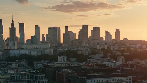 Aerial view of Warsaw skyline at sunset in Poland.