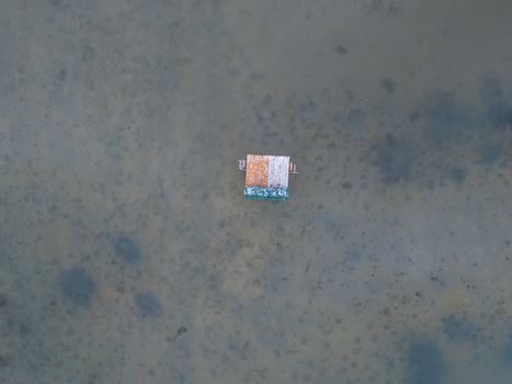 Aerial view of low water near fishing pier at Lake Balaton Hungary in drought Aerial view of low water near fishing pier at Lake Balaton Hungary in drought