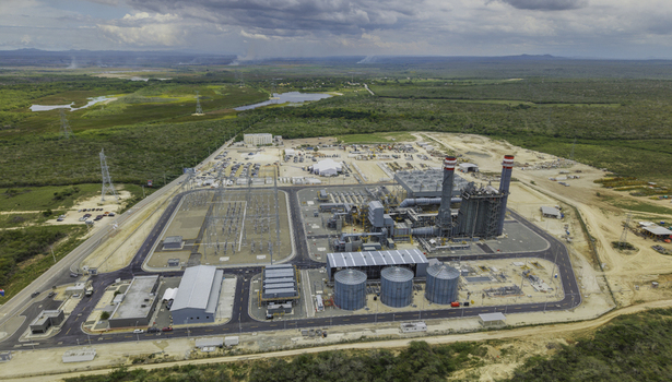 Aerial view of the Manzanillo Power Plant featuring industrial structures storage tanks and electrical infrastructure in Pepillo Salcedo Monte Cristi Province Dominican Republic. Aerial view of the Manzanillo Power Plant featuring industrial structures storage tanks and electrical infrastructure in Pepillo Salcedo Monte Cristi Province Dominican Republic.
