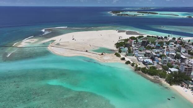 Aerial view of Gulhi island with turquoise waters Maldives. Aerial view of Gulhi island with turquoise waters Maldives.