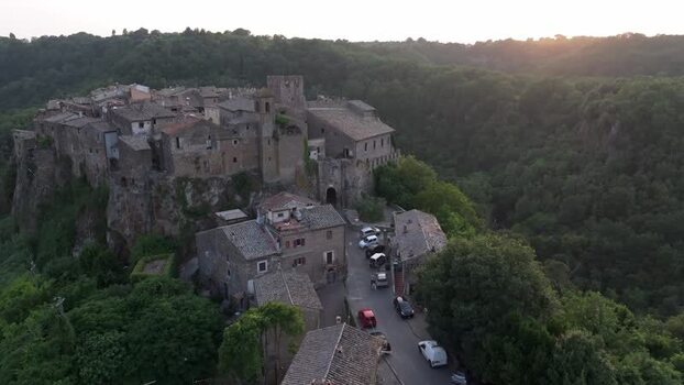 Aerial view of historic Calcata village on a cliff Italy. Aerial view of historic Calcata village on a cliff Italy.