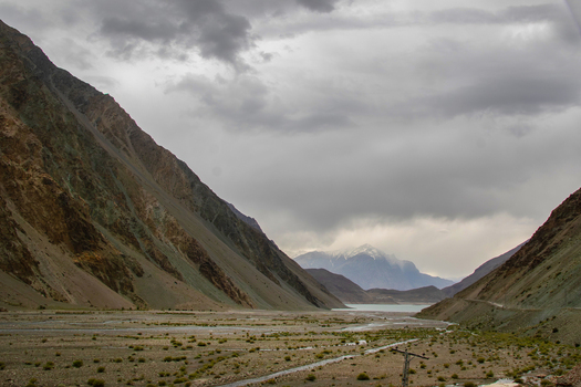 View of Satpara Dam nestled between rugged mountain slopes under a dramatic cloudy sky in Skardu Gilgit Pakistan. View of Satpara Dam nestled between rugged mountain slopes under a dramatic cloudy sky in Skardu Gilgit Pakistan.