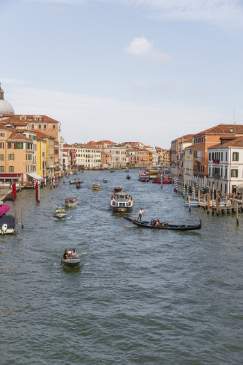 Venice Italy 21 September 2026 View of the Grand Canal with gondolas water taxis and historic buildings lining the waterway under a clear sky. Venice Italy 21 September 2026 View of the Grand Canal with gondolas water taxis and historic buildings lining the waterway under a clear sky.