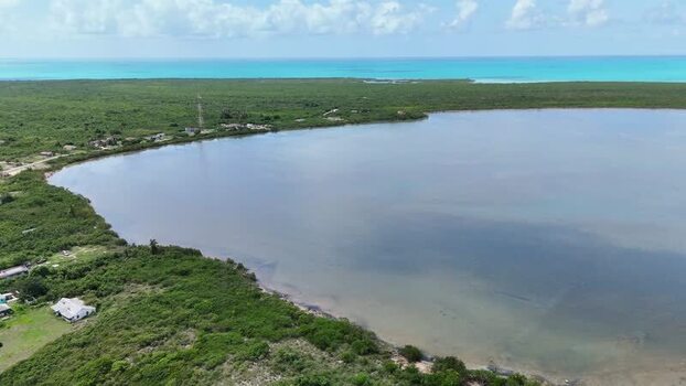 Aerial view of the Salt trading post and lagoon in Exuma The Bahamas. Aerial view of the Salt trading post and lagoon in Exuma The Bahamas.