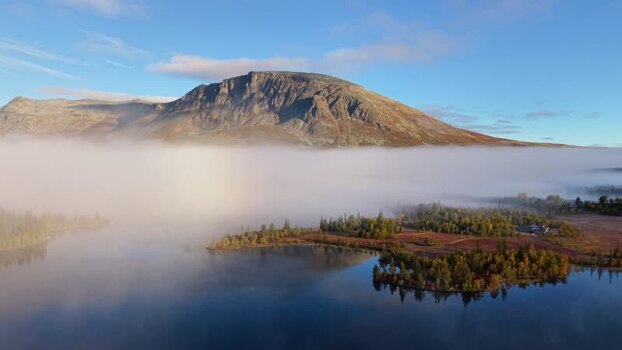 Aerial view of Mount Skogshorn and Lake Helsingvatnet Norway. Aerial view of Mount Skogshorn and Lake Helsingvatnet Norway.