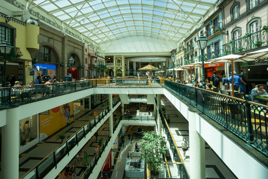 Porto Portugal 13 July 2021 View of the Via Catarina Shopping a vibrant multi level space where natural light dances across colorful facades and bustling walkways. Porto Portugal 13 July 2021 View of the Via Catarina Shopping a vibrant multi level space where natural light dances across colorful facades and bustling walkways.