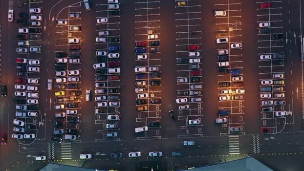 Aerial view of a parking lot at dusk in Russia. Aerial view of a parking lot at dusk in Russia.