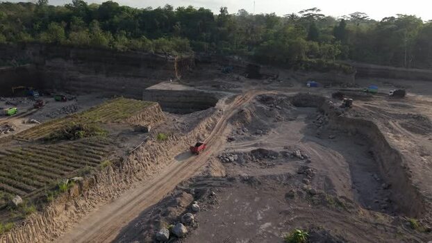 Aerial view of quarry with trucks Indonesia. Aerial view of quarry with trucks Indonesia.