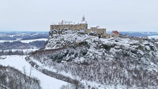 Aerial view of Riegersburg Castle on a snowy hill Austria.