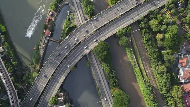 Aerial view of highway bridges over a river and railway tracks. Aerial view of highway bridges over a river and railway tracks.