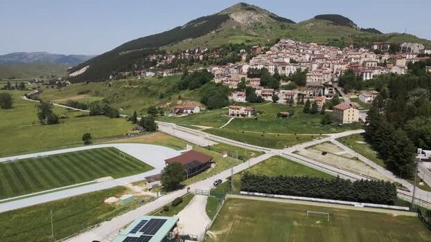 Aerial view of Rivisondoli town and green hills Italy. Aerial view of Rivisondoli town and green hills Italy.