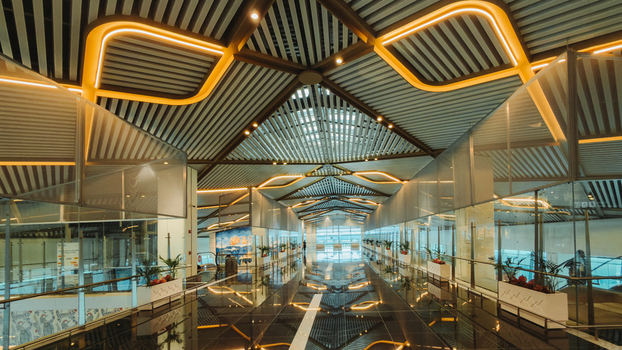Bhogapuram India 22 August 2026 View of Alluri Sitarama Raju International Airport terminal interior with modern geometric ceiling lighting and glass partitions. Bhogapuram India 22 August 2026 View of Alluri Sitarama Raju International Airport terminal interior with modern geometric ceiling lighting and glass partitions.