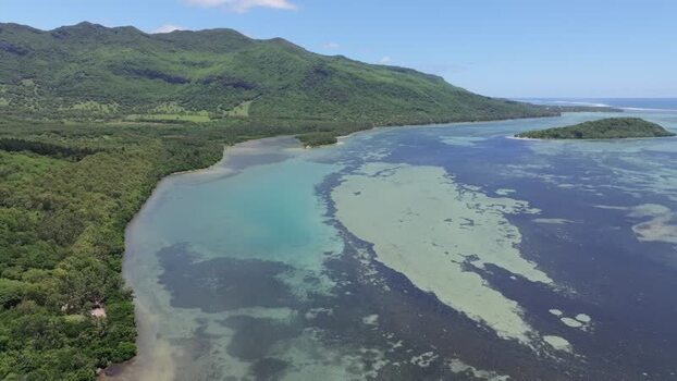 Aerial view of Le Morne Brabant mountain and lagoon Mauritius.