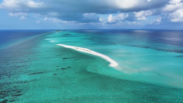 Aerial view of a white sandbank in turquoise waters Maldives. Aerial view of a white sandbank in turquoise waters Maldives.