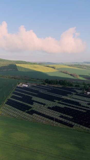 Aerial view of a solar farm and green fields Czechia.