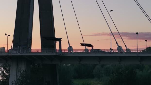 Aerial view of Siekierkowski Bridge at sunset in Warsaw Poland.