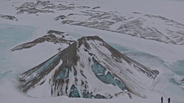 Aerial view of snowy mountain landscape in Svalbard and Jan Mayen.