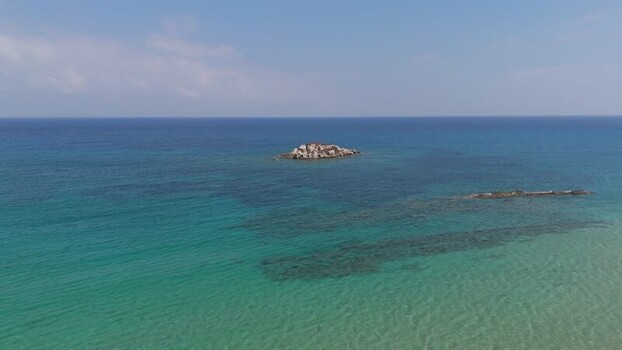 Aerial view of a small rocky island in Northern Cyprus.