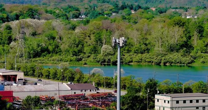Aerial view of a telecommunications tower near a river United States Aerial view of a telecommunications tower near a river United States