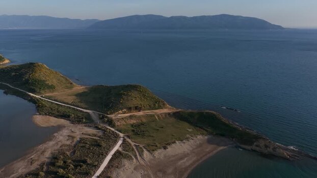 Aerial view of the rugged coastline and hills in Zvernec Albania.