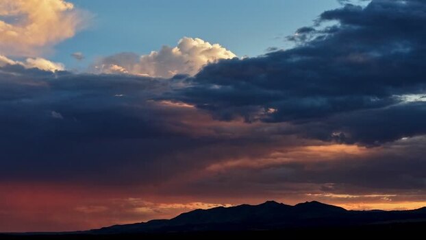 Aerial view of sunset light on rain clouds United States.