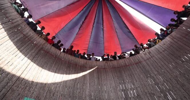View of spectators at a Well of Death stunt arena Bangladesh.
