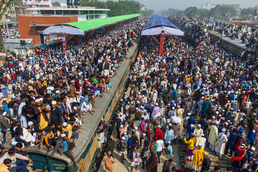 Tongi Bangladesh 04 February 2024 Aerial view of Tongi Junction train station crowded with thousands of pilgrims sitting on train roofs and platforms during the Bishwa Ijtema. Tongi Bangladesh 04 February 2024 Aerial view of Tongi Junction train station crowded with thousands of pilgrims sitting on train roofs and platforms during the Bishwa Ijtema.