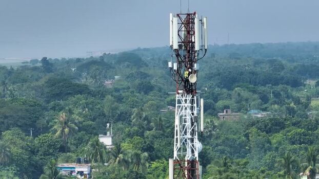 Aerial view of a technician on a telecom tower Bangladesh.