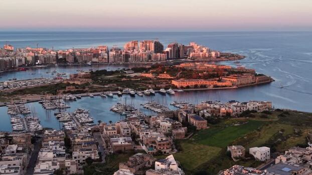 Aerial view of yachts in the harbor at sunset Malta. Aerial view of yachts in the harbor at sunset Malta.