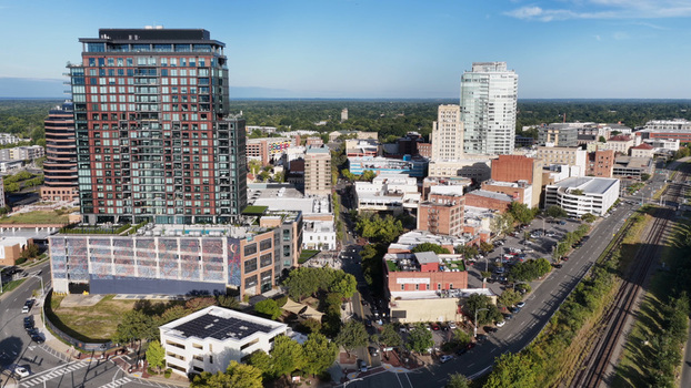 Aerial view of the Durham skyline featuring modern high rise buildings urban architecture and surrounding greenery in Durham North Carolina United States.