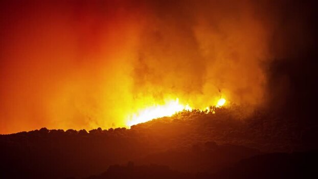 View of wildfire on a hillside in Spain.