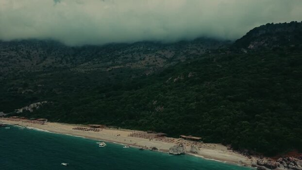 Aerial view of the Sarande coastline and lush mountains Albania. Aerial view of the Sarande coastline and lush mountains Albania.