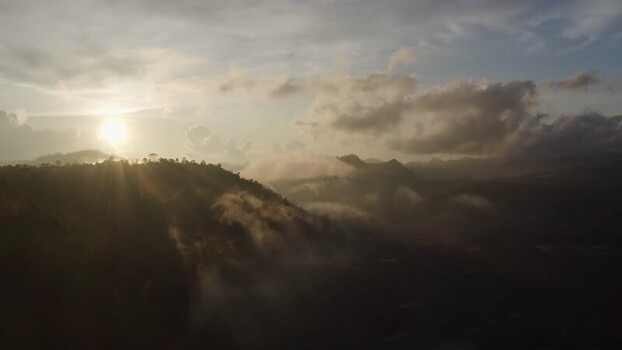 Aerial view of misty mountains at sunrise Indonesia. Aerial view of misty mountains at sunrise Indonesia.