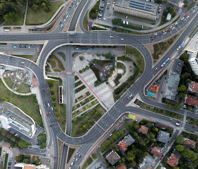 Aerial view of a complex multi level road intersection with tram tracks and urban infrastructure in Poland. Aerial view of a complex multi level road intersection with tram tracks and urban infrastructure in Poland.
