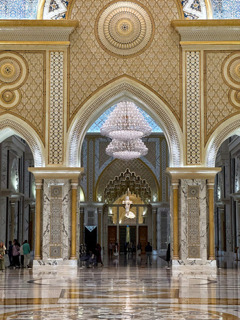 Abu Dhabi United Arab Emirates 14 October 2023 View of the opulent Qasr Al Watan Presidential Palace interior featuring intricate golden patterns marble columns and a crystal chandelier. Abu Dhabi United Arab Emirates 14 October 2023 View of the opulent Qasr Al Watan Presidential Palace interior featuring intricate golden patterns marble columns and a crystal chandelier.