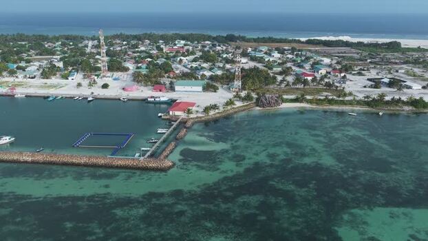 Aerial view of the harbor and village of Makunudhoo Maldives. Aerial view of the harbor and village of Makunudhoo Maldives.