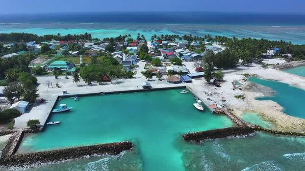 Aerial view of the harbor and village on Naavaidhoo island Maldives. Aerial view of the harbor and village on Naavaidhoo island Maldives.