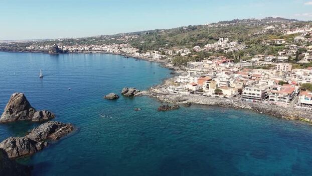 Aerial view of the coastline and Norman Castle in Aci Castello Italy.