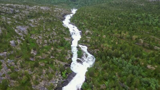 Aerial view of Kjemafossen waterfall in the forest Norway.