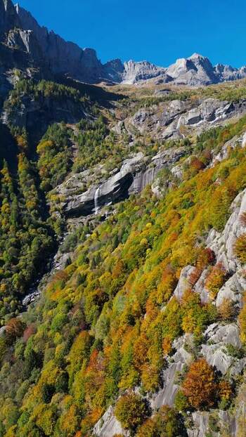 Aerial view of Val di Mello with autumn foliage and rocky peaks Italy. Aerial view of Val di Mello with autumn foliage and rocky peaks Italy.