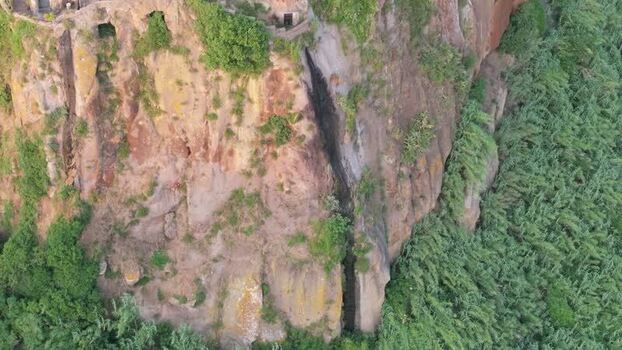 Aerial view of Calcata village on a rocky cliff in Italy. Aerial view of Calcata village on a rocky cliff in Italy.